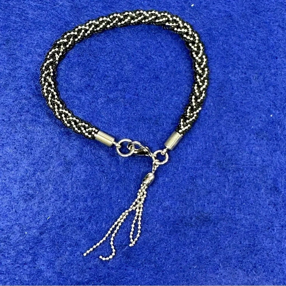 Boho Braided Silver tone and black bracelet with tassel.